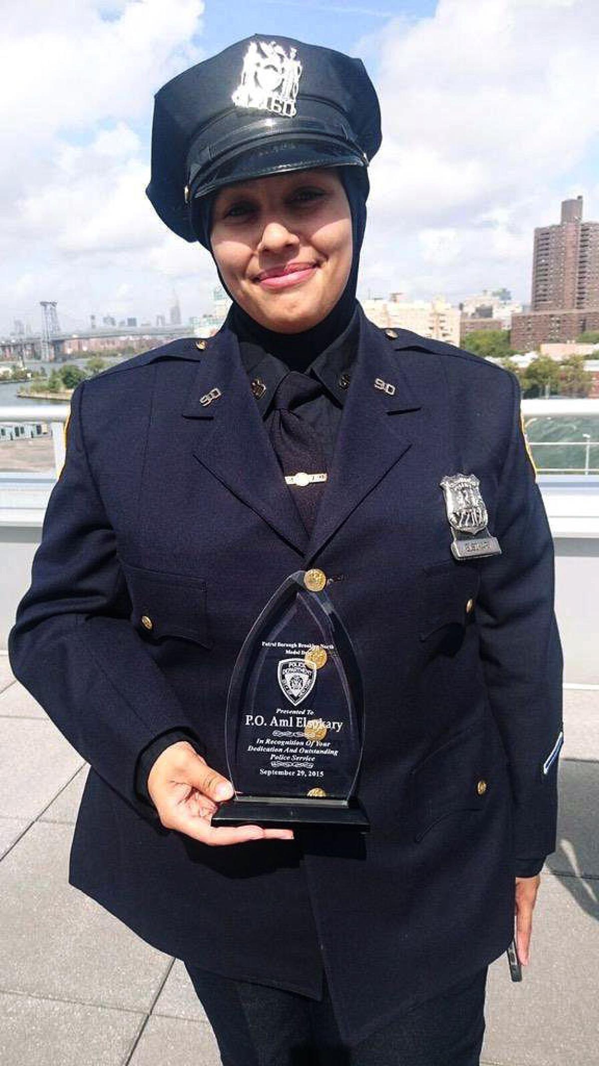 'Hero' Muslim cop, her son harassed by bigot in Brooklyn who shouted 'I will cut your throat'