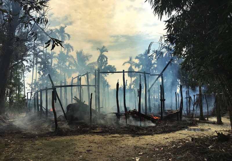 New fires in empty Rohingya village challenge Myanmar claims