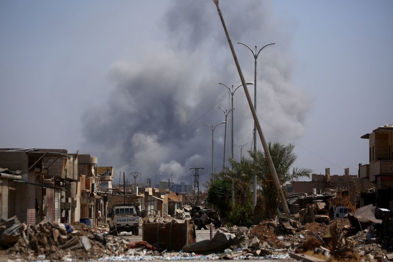 The Last Days of ISIS’ Capital: Airstrikes if You Stay, Land Mines if You Flee