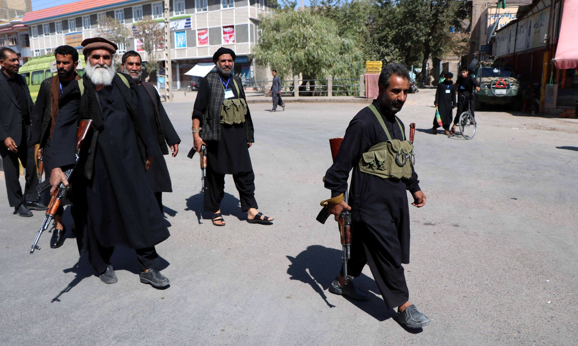 'Isis will be looking for targets': guns and fear mark Afghan Ashura