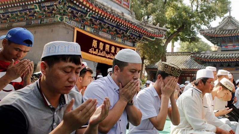China rejects Turkey criticism on Uighurs, denies poet's death