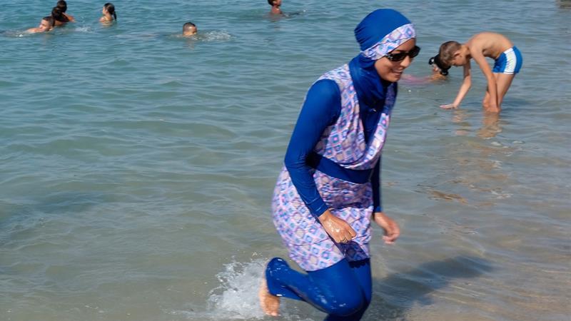 Pools in France close after women defy burkini ban