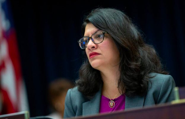 A school board member’s Facebook post suggested his ‘life would be complete’ if Rashida Tlaib died