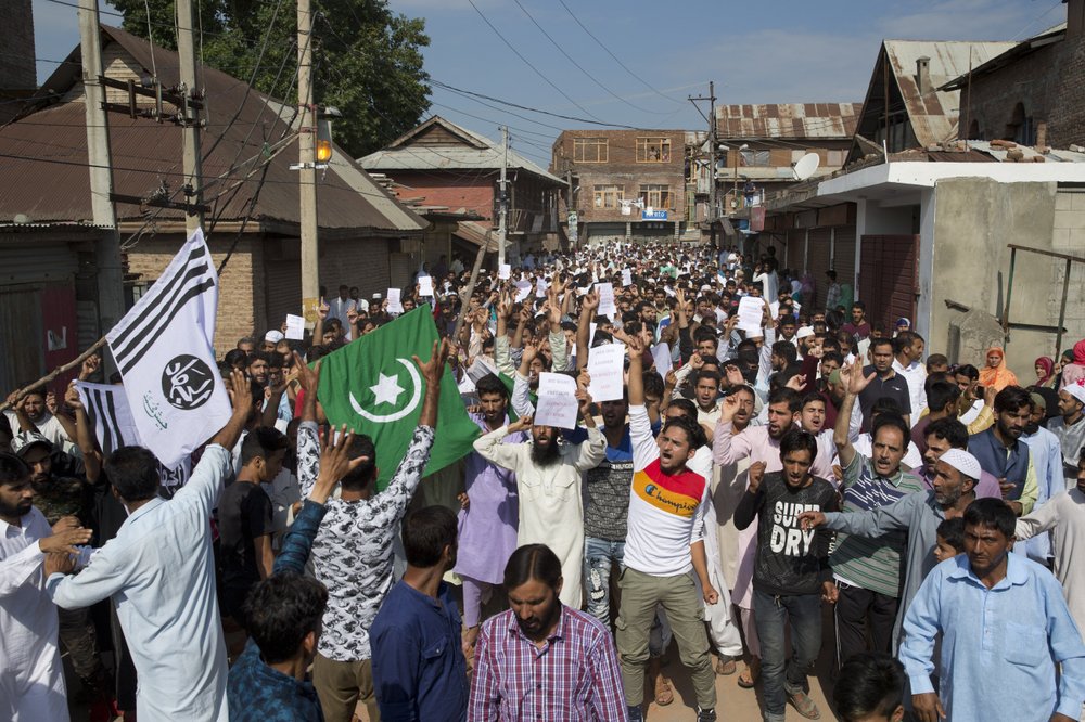 Troops let some Muslims go to mosques in locked-down Kashmir